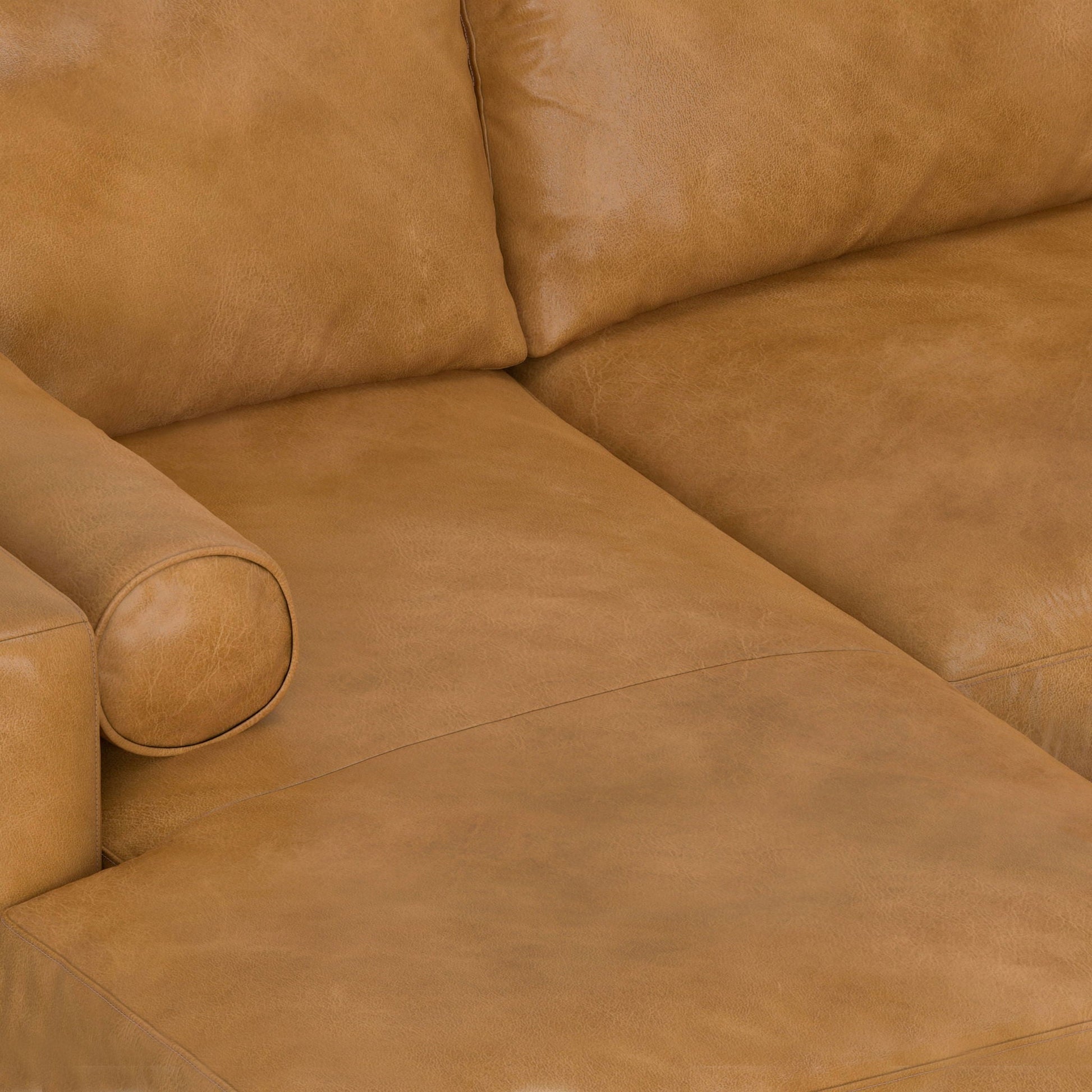 Morrison Upholstered Sectional Sofa tan leather cushions with visible stitching on Tampa Home & Garden Store