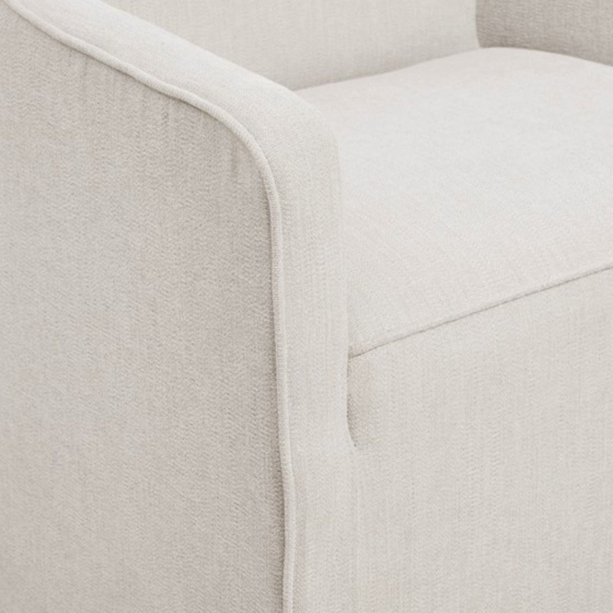 Traditional skirted dining arm chair close-up in neutral gray-beige fabric with piping on Tampa Home & Garden Store