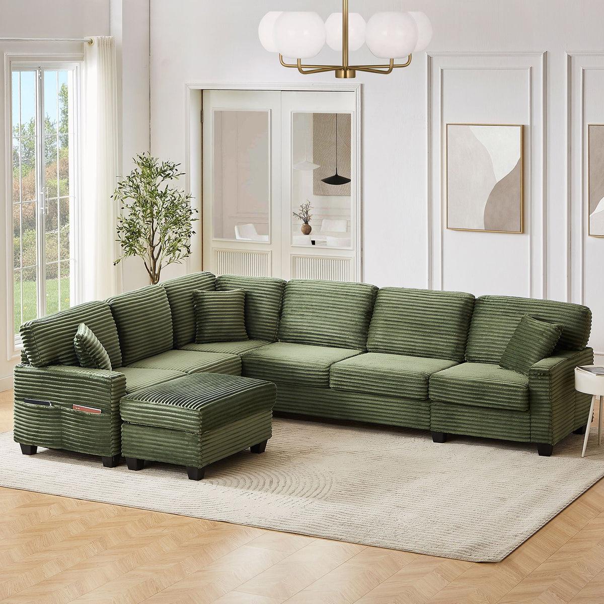 Green ribbed U-shaped sectional sofa with movable ottomans and side storage pockets on Tampa Home & Garden Store