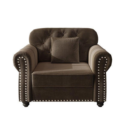 Sofa with nailhead trim and rolled armrests