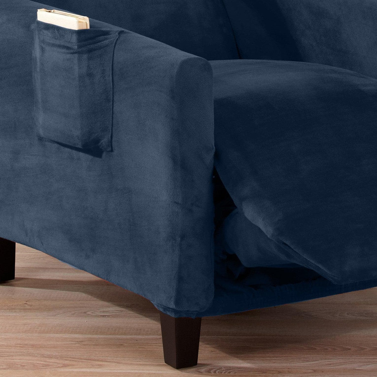 Velvet stretch slipcover on navy blue sofa, Gale Collection by Great Bay Home on Tampa Home & Garden Store