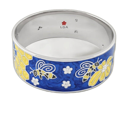 Animal Paradise Bangle tin packaging with blue and yellow honeycomb bees motif and LGA logo inside on Tampa Home & Garden Store