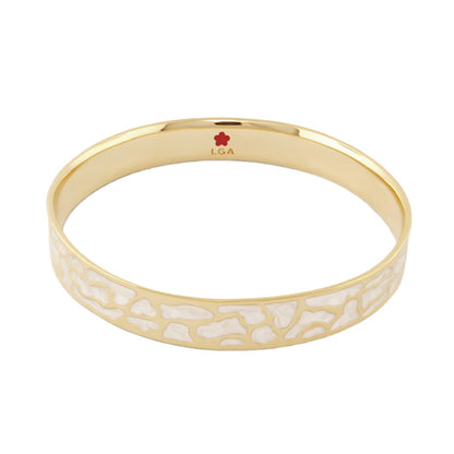 Animal Paradise Bangle — Giraffe Print bracelet in gold with white enamel spots; LGA logo inside on Tampa Home & Garden Store