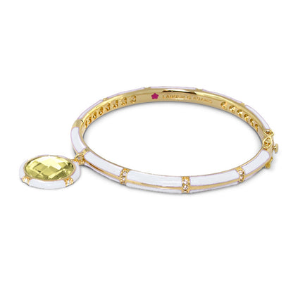 Prince Charming Bangle by Lauren G Adams — white enamel panels on a gold-tone bracelet with an enamel-framed round charm and pale yellow-green gem on Tampa Home & Garden Store