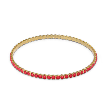 Stackable enamel dots bangle by Lauren G Adams in gold-tone with red enamel accents on Tampa Home & Garden Store