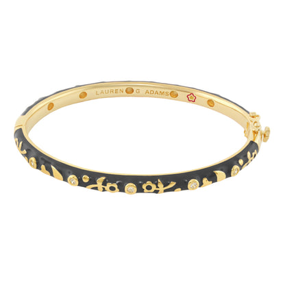 Stackable Desire Bangle, gold-tone bracelet with black enamel floral motif and crystals on Tampa Home & Garden Store