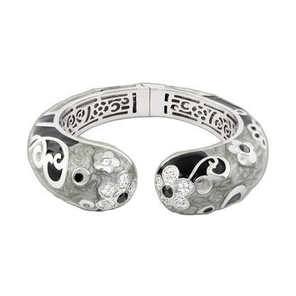 Daisy Swirl Bangle set: two silver stackable bracelets with daisy engravings and crystal accents on Tampa Home & Garden Store