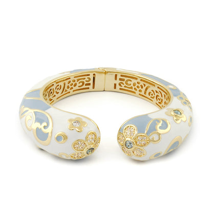 Daisy Swirl Bangle in white and powder blue enamel with gold floral filigree and crystal accents by Lauren G Adams on Tampa Home & Garden Store