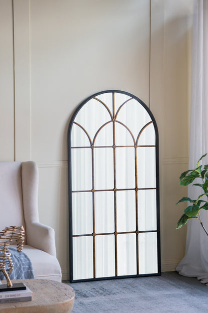 34x65.5' Arched Full-Length Mirror with black frame and gold windowpane grid in a living room on Tampa Home & Garden Store