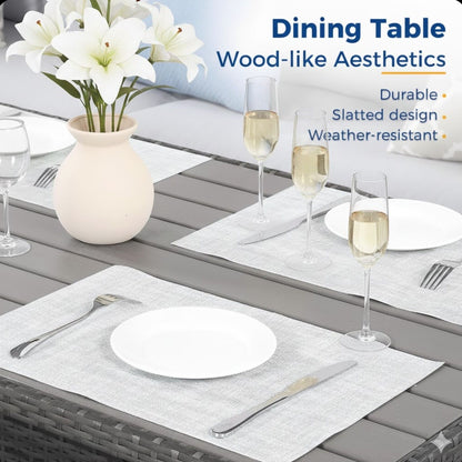 Outdoor dining set on gray slatted table with white plates, wine glasses, and lily centerpiece on Tampa Home & Garden Store