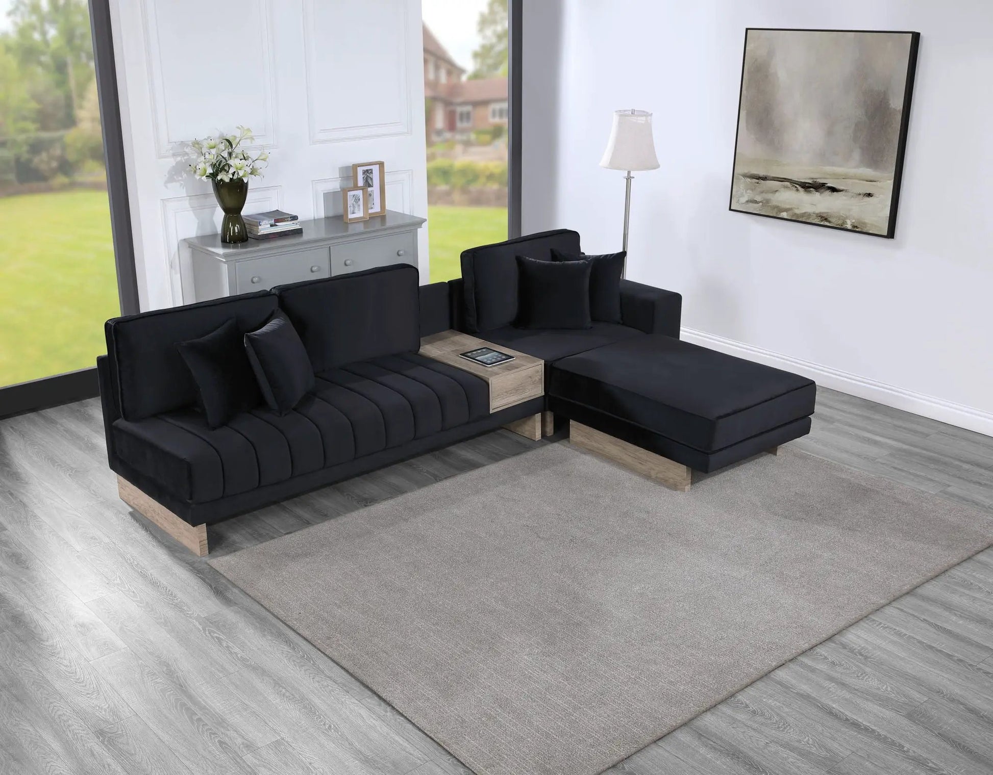 Memphis reversible sectional sofa with storage ottoman in black fabric and light wood legs on Tampa Home & Garden Store