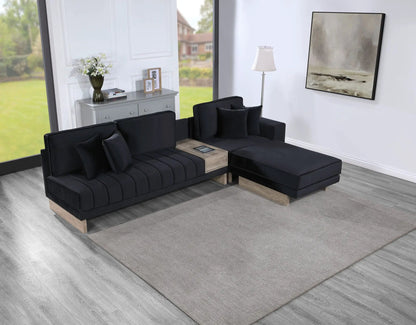 Memphis reversible sectional sofa with storage ottoman in black fabric and light wood legs on Tampa Home & Garden Store