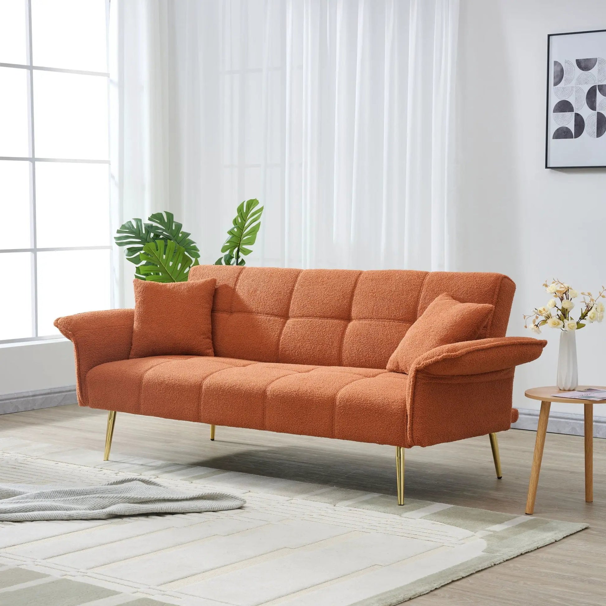 Futon sofa bed orange fabric with folding arms and gold legs by Unique Piece Furniture on Tampa Home & Garden Store