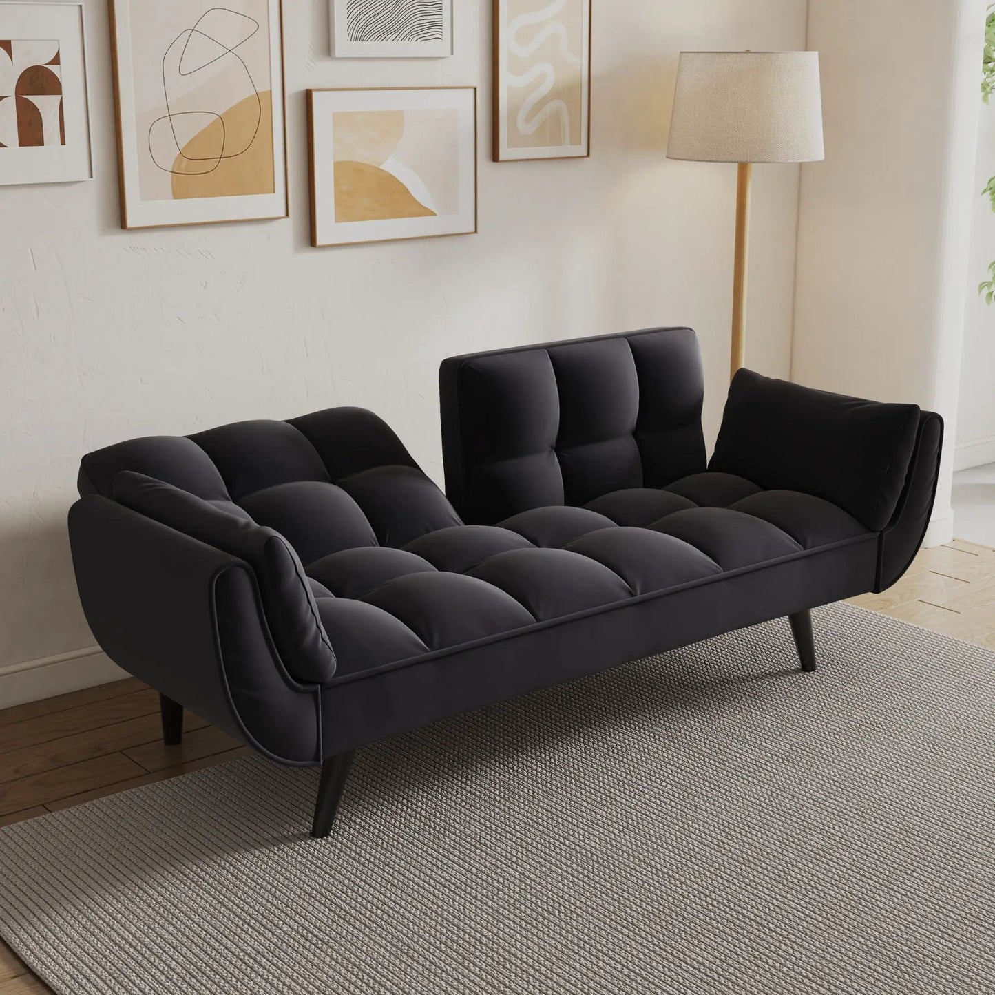 Futon sofa black faux-leather with tufted cushions and two armrests on Tampa Home & Garden Store