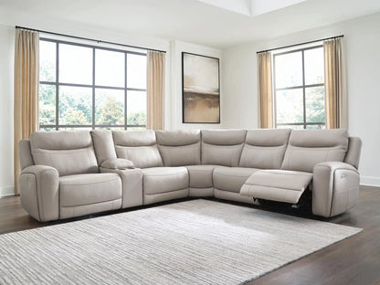 Gravier reclining sectional in light gray leather with power recliners in living room on Tampa Home & Garden Store