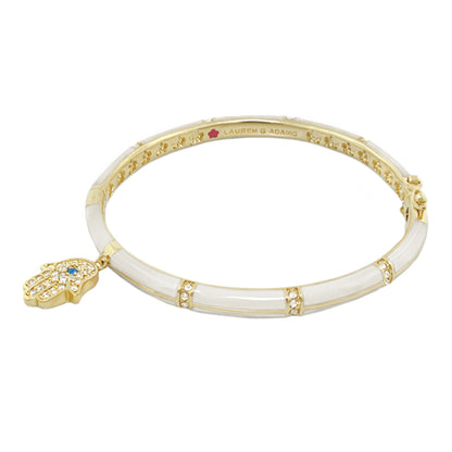 Lucky Hamsa Stackable Bangle by Lauren G Adams, gold and white enamel with hamsa charm on Tampa Home & Garden Store