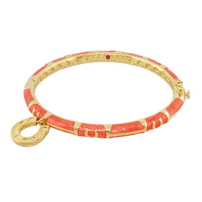 Equestrian horseshoe charm bangle with coral enamel segments in gold-tone metal on Tampa Home & Garden Store