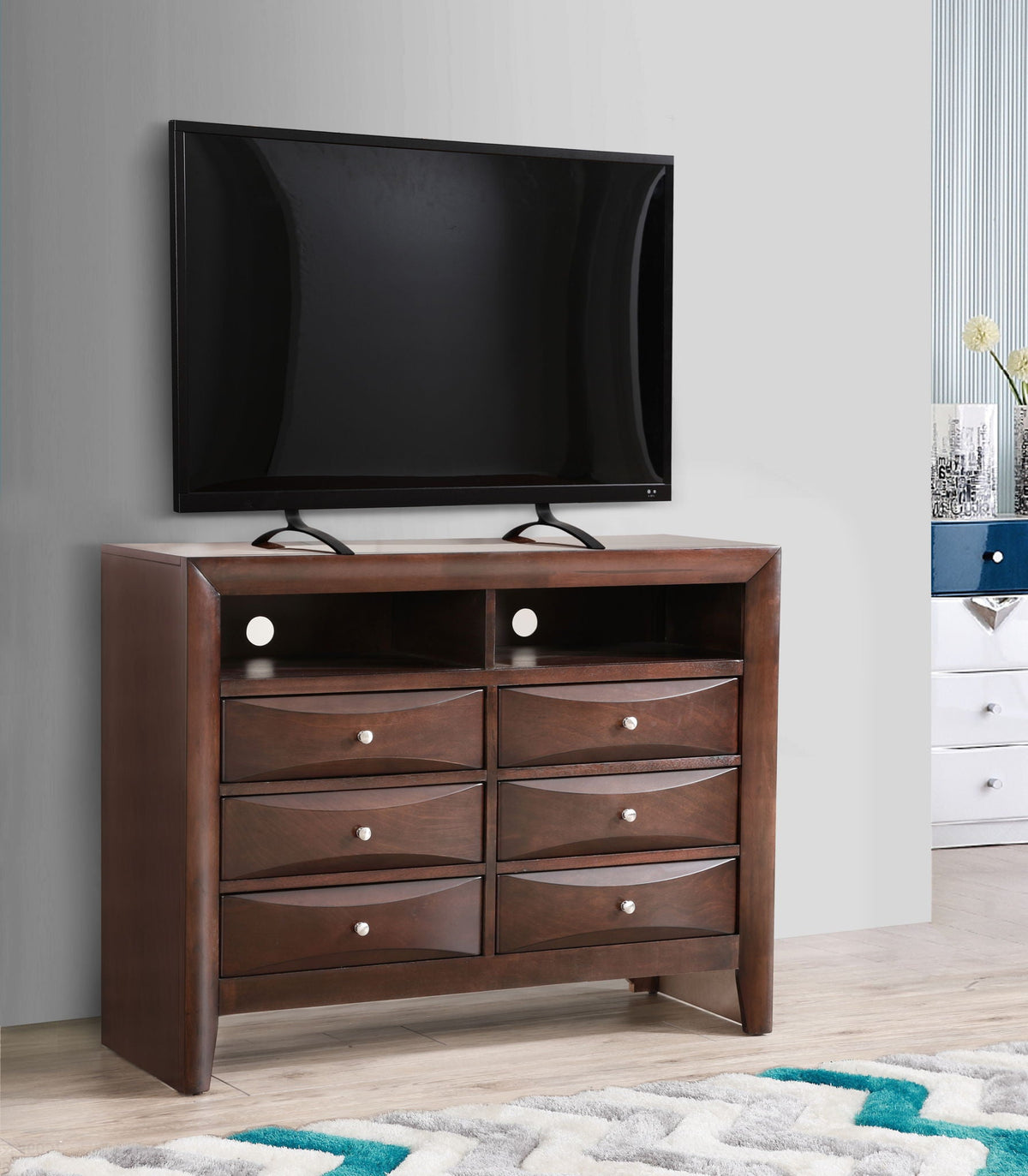 HouseOfZazla media chest with modern beveled drawer fronts in dark wood, TV on top on Tampa Home & Garden Store