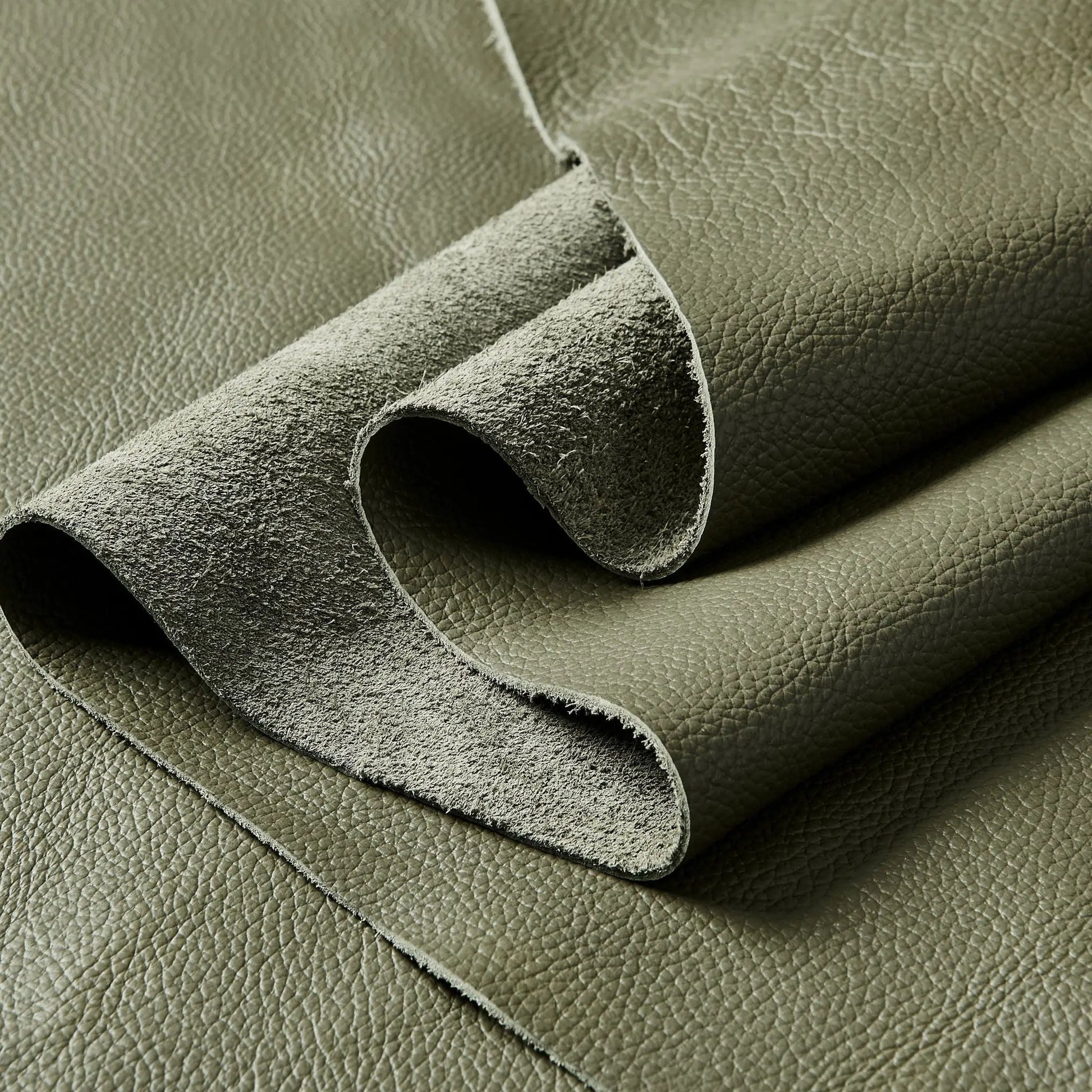 Upholstered Sectional fabric swatch olive green textured leather Unique Piece Furniture on Tampa Home & Garden Store