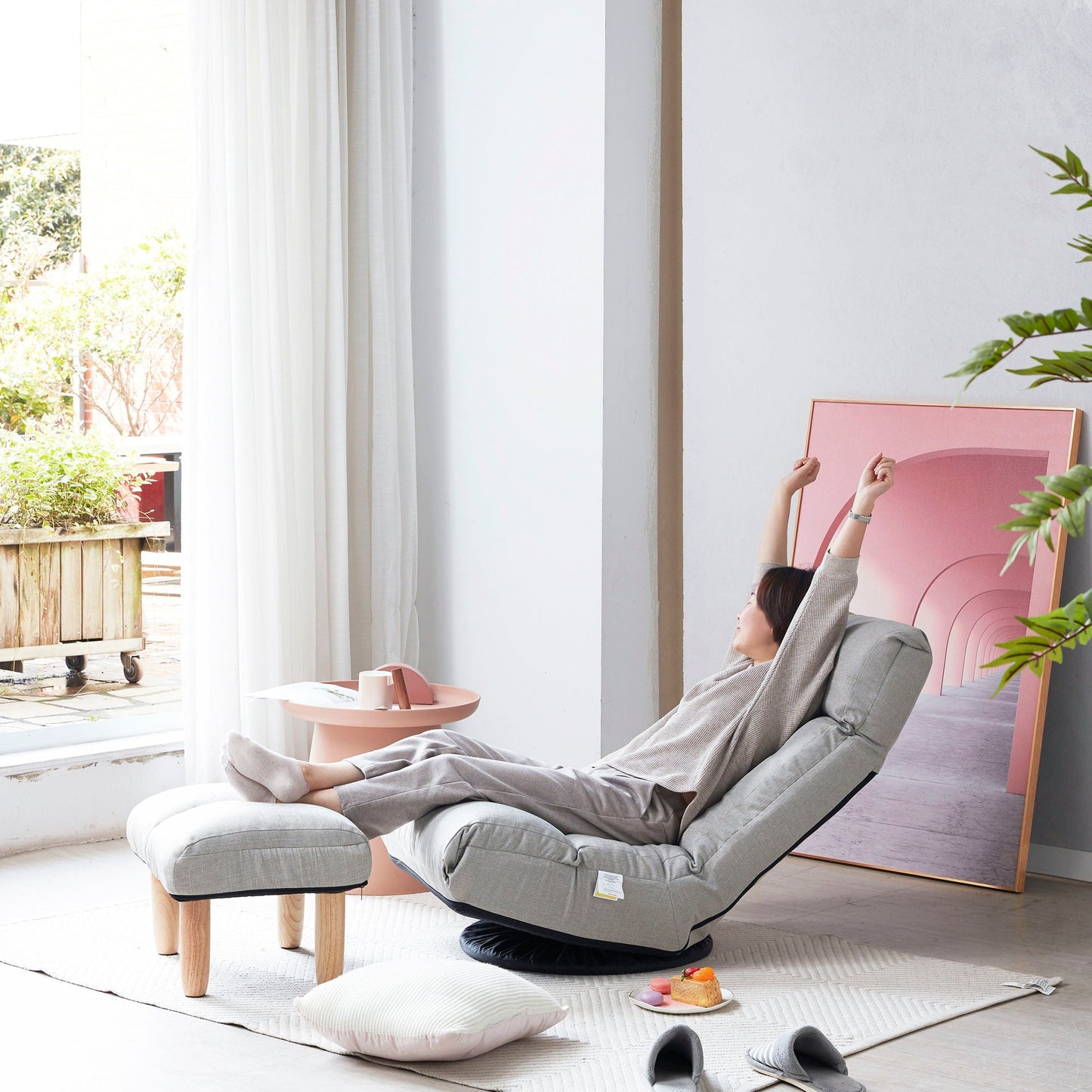 Adjustable Japanese reclining floor chair with gray fabric and metal frame on Tampa Home & Garden Store