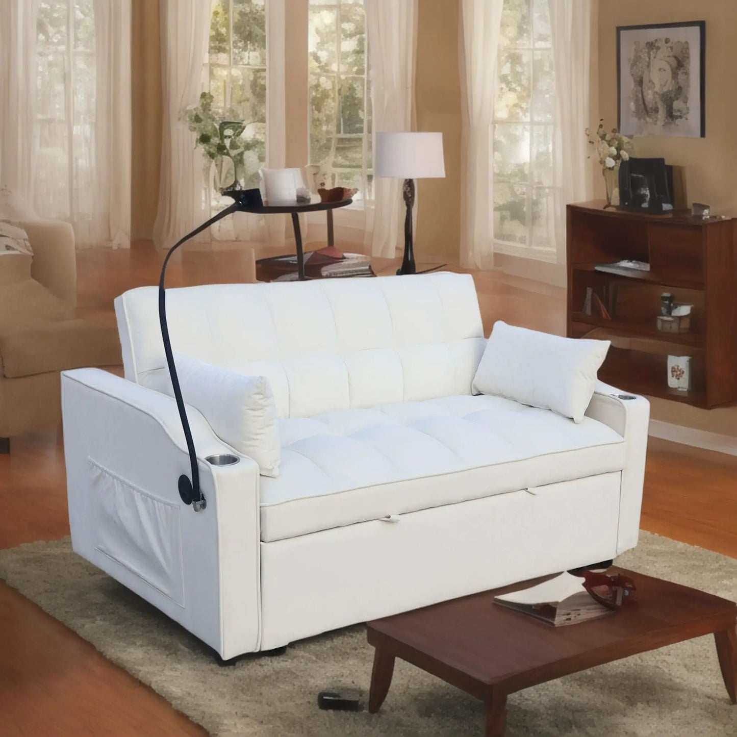 Modern white futon loveseat with pullout bed and adjustable back in a bright living room on Tampa Home & Garden Store