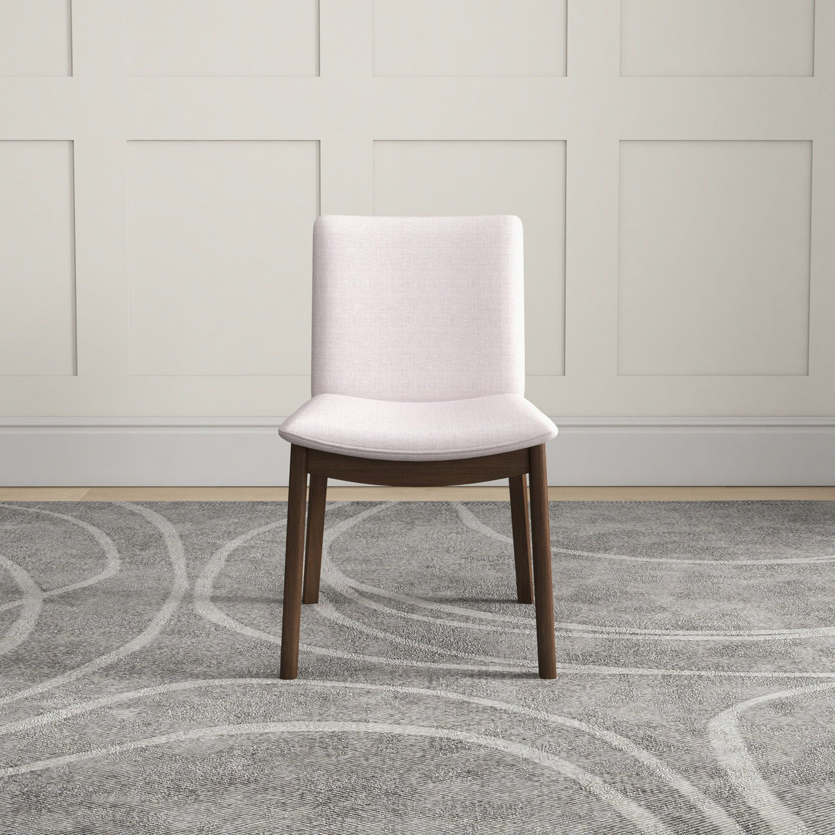 Mid-Century Modern solid wood dining chair with cream fabric upholstery and dark wood legs on Tampa Home & Garden Store
