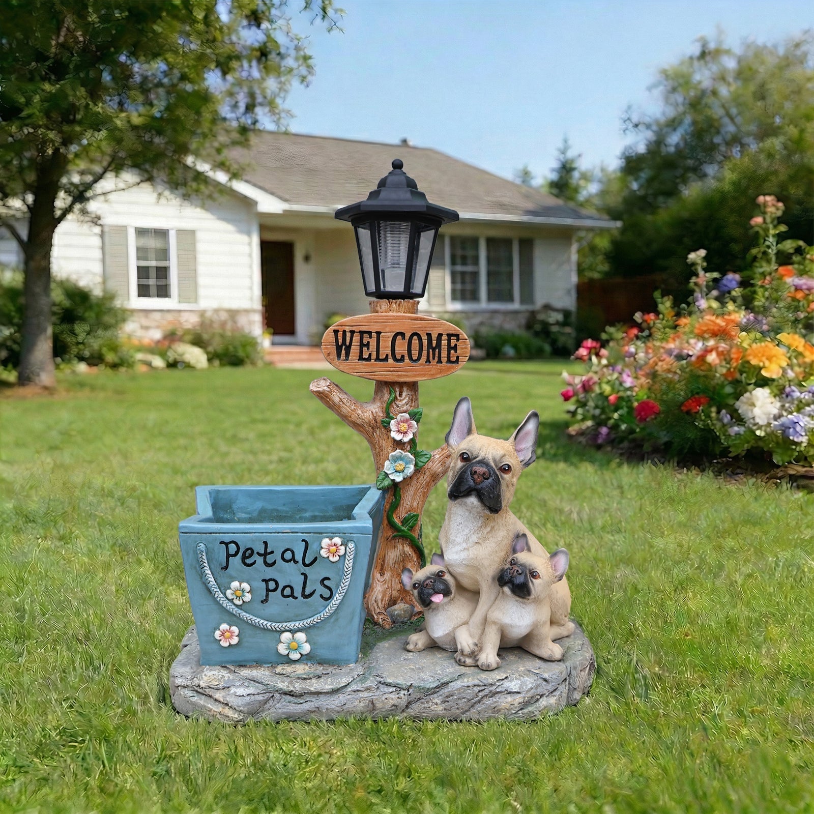 French Bulldog family planter statue by HouseOfZazla with black lantern and blue planter on Tampa Home & Garden Store