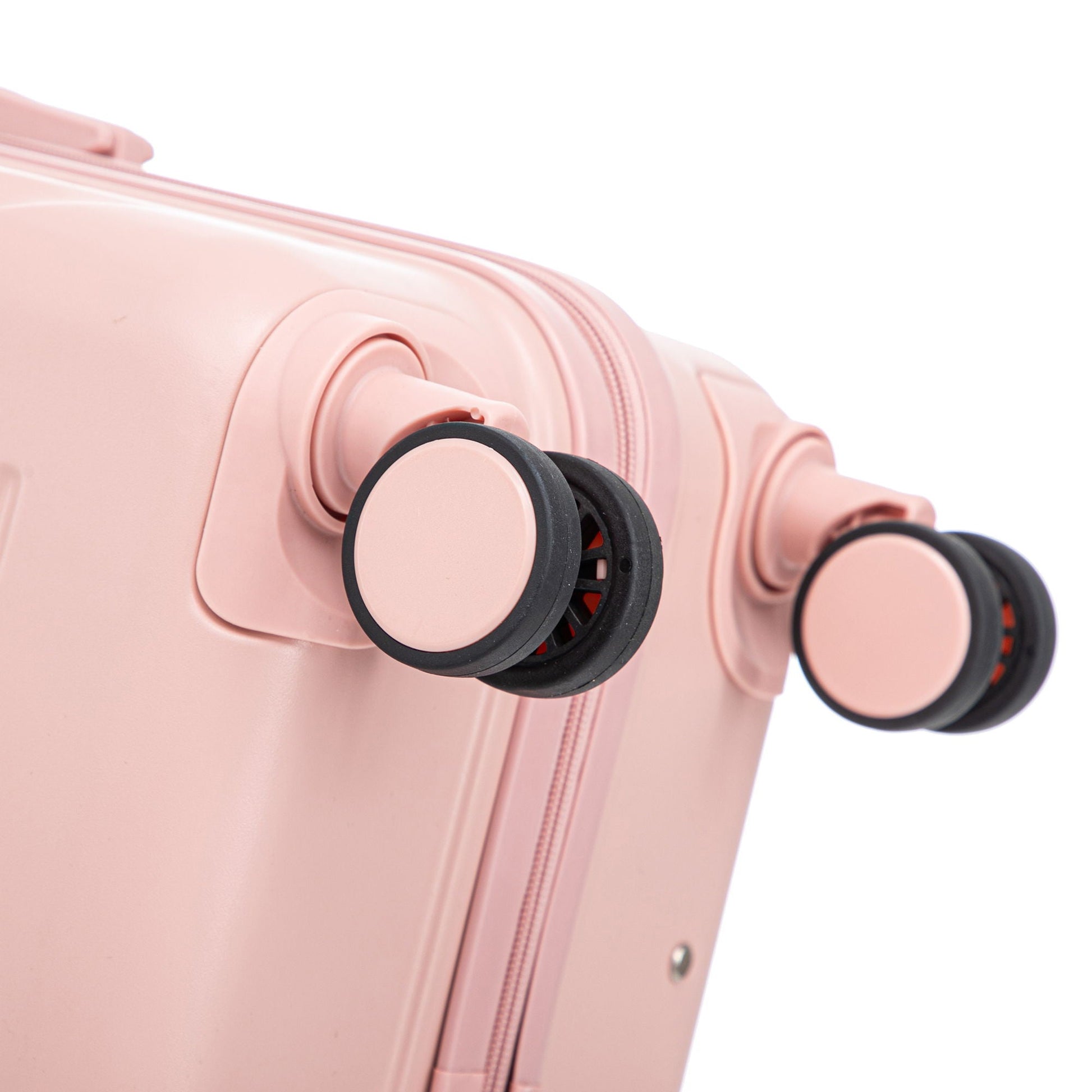 HouseOfZazla pink spinner luggage close-up with zipper and black wheel housings on Tampa Home & Garden Store