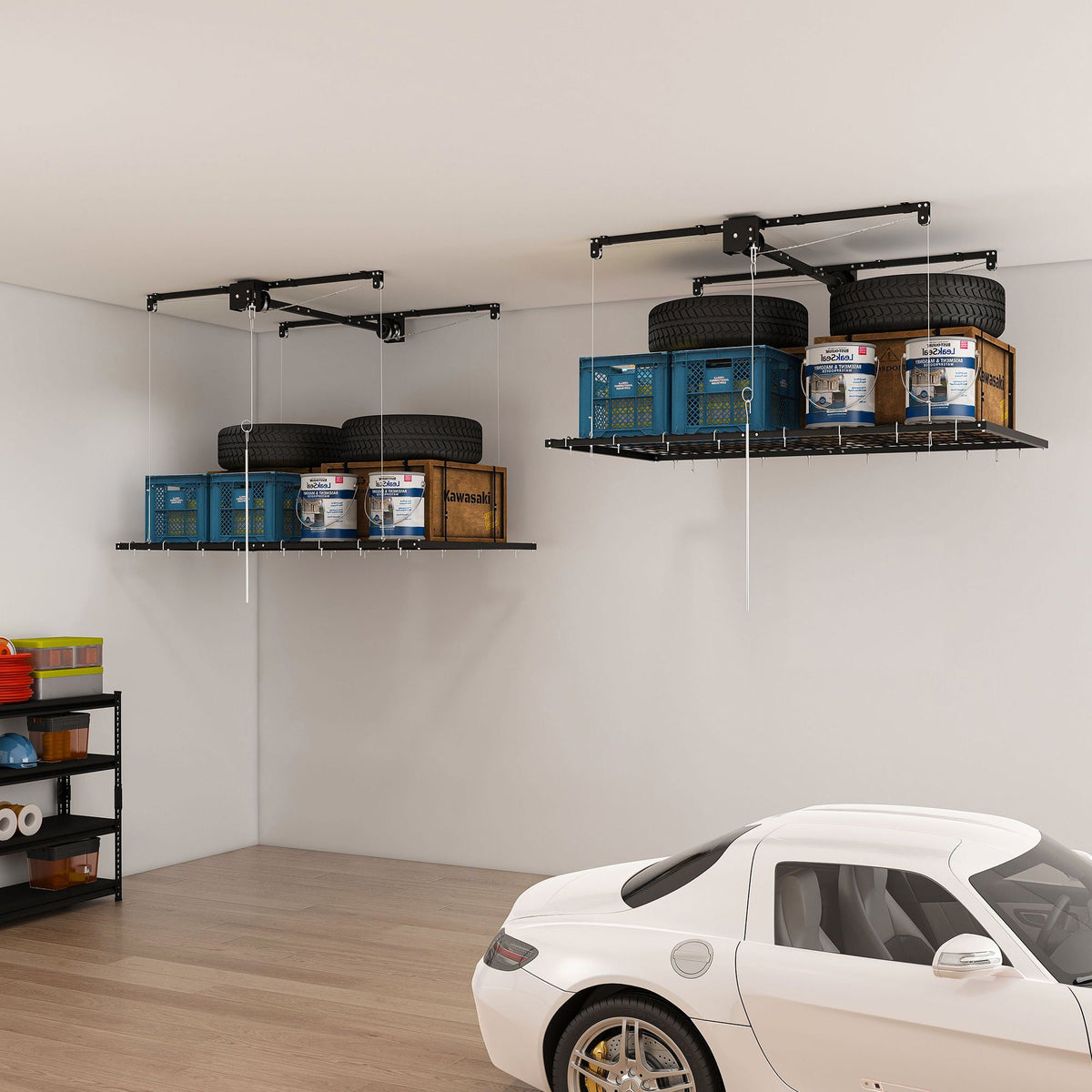 Overhead garage storage rack with crank system in black ceiling shelving storing tires and bins on Tampa Home & Garden Store