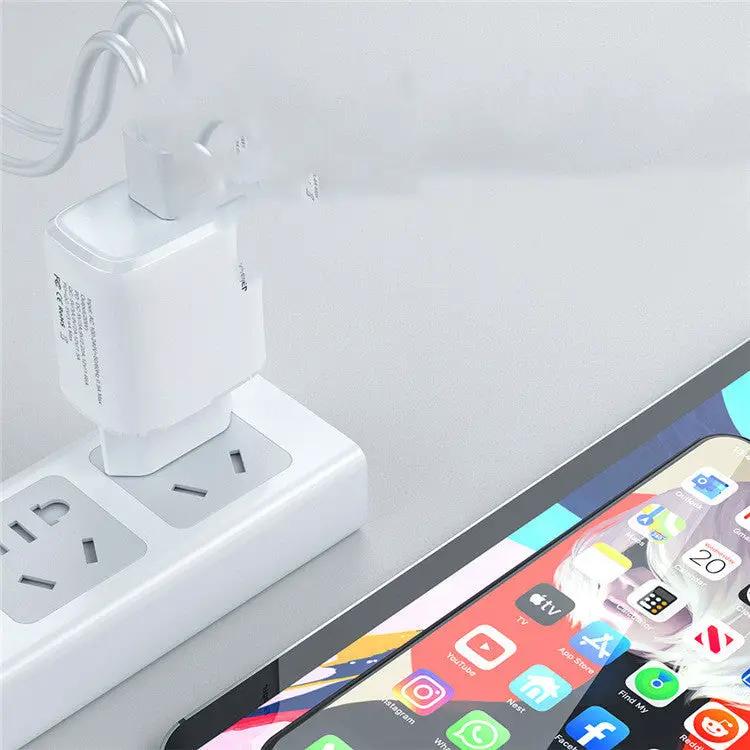 Mobile Phone Charger Fast Charge Adapter, white, plugged into a power strip beside a tablet on Tampa Home & Garden Store