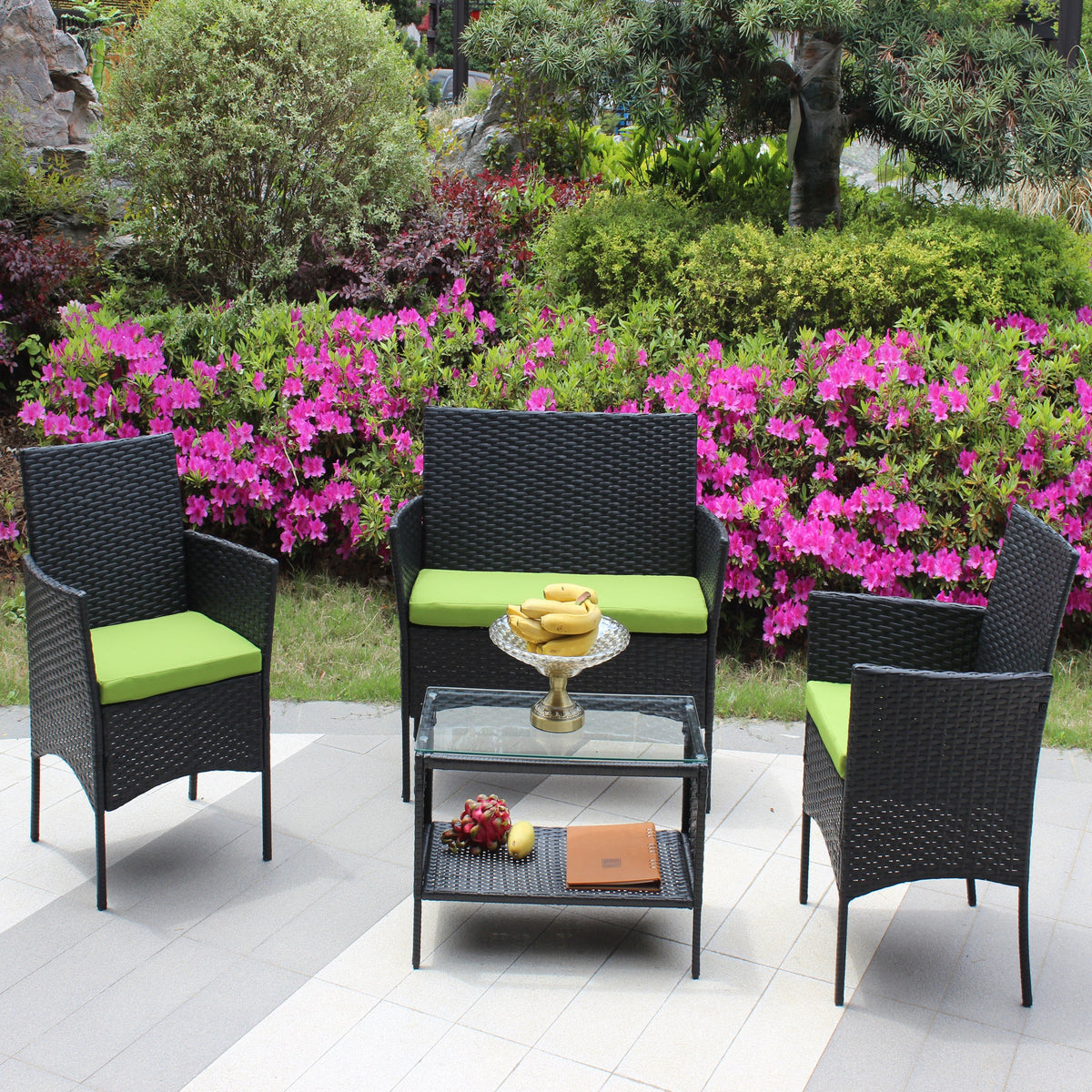 4 pc rattan patio furniture set with black wicker chairs and lime green cushions on Tampa Home & Garden Store