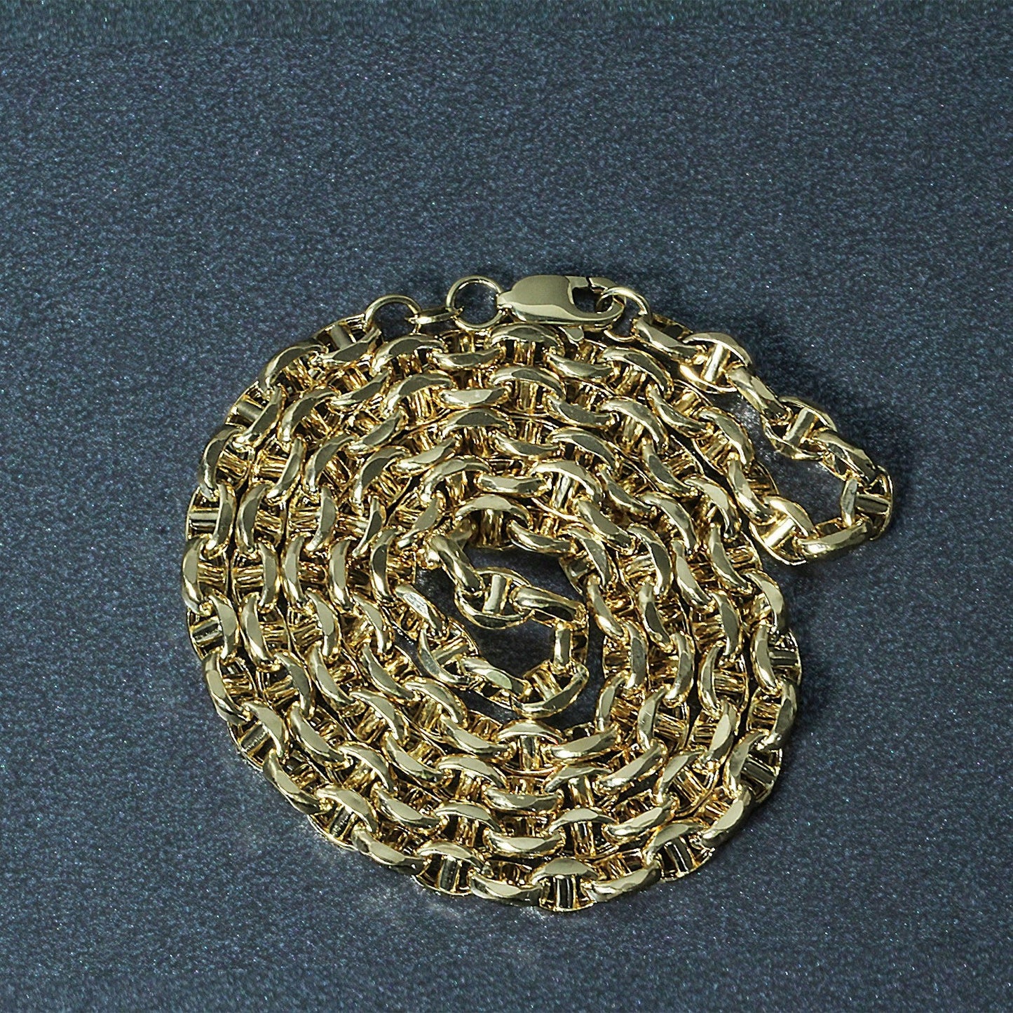Anchor chain necklace 4.5mm 14k yellow gold, Bids.com brand, coiled display on Tampa Home & Garden Store