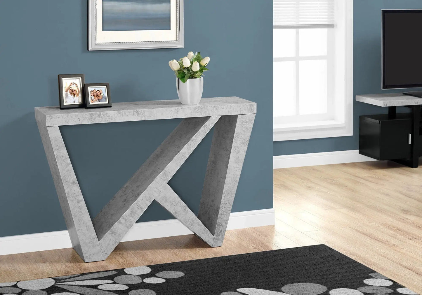 Accent console table for entryway in concrete gray with cross legs and 2 photo frames on top on Tampa Home & Garden Store