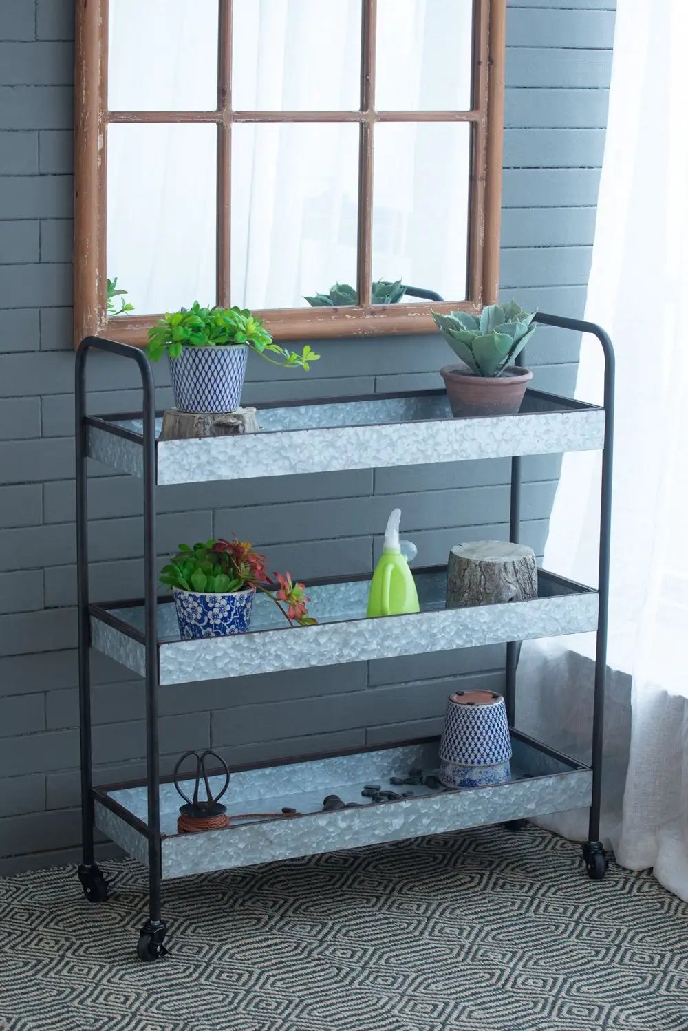 Homestead Galvanized Shelf Display 3-Tier etagere in metallic gray with black frame casters on Tampa Home & Garden Store