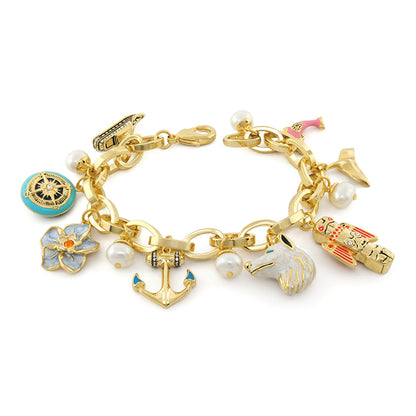 Eau Alaska Charm Bracelet by Lauren G Adams, gold-tone chain with anchor, compass, swan charms on Tampa Home & Garden Store