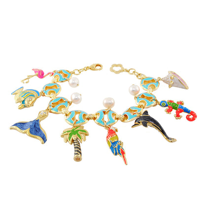 Eau Island Life Bracelet by Lauren G Adams, gold-tone with aqua enamel links and tropical charms on Tampa Home & Garden Store