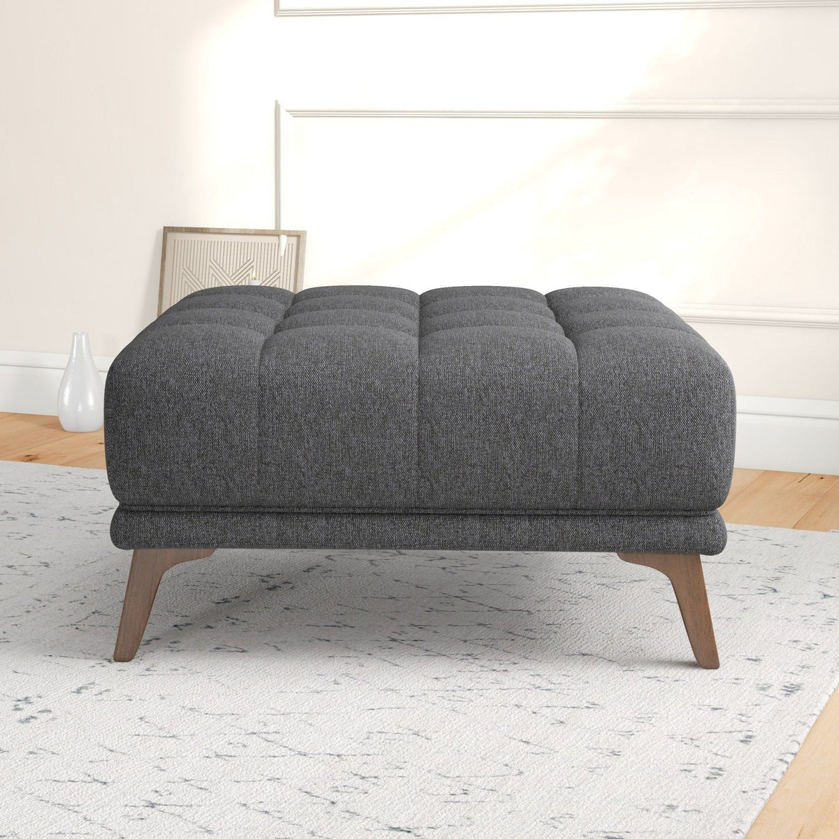 Addison Square upholstered ottoman in dark gray fabric with tufted square cushions and wood legs on Tampa Home & Garden Store