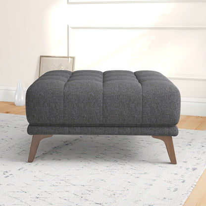 Addison Square upholstered ottoman in dark gray fabric with tufted square cushions and wood legs on Tampa Home & Garden Store