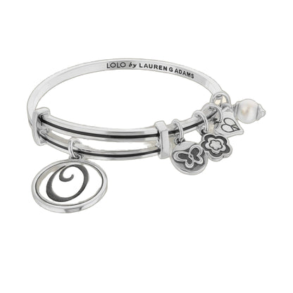 Initial O Bangle bracelet by Lauren G Adams with dangling charms, silver tone on Tampa Home & Garden Store