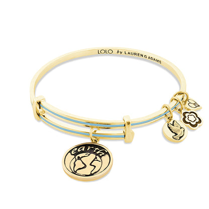Lolo Earth Bangle by Lauren G Adams with gold tone band, enamel strands, globe and dove charms on Tampa Home & Garden Store