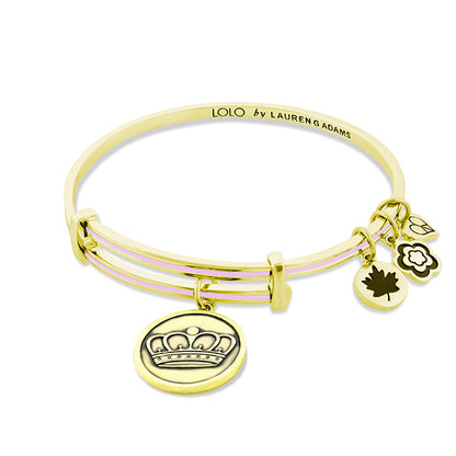 Lolo Queen Bangle bracelet by Lauren G Adams, gold-tone with pink enamel bands and crown charm on Tampa Home & Garden Store