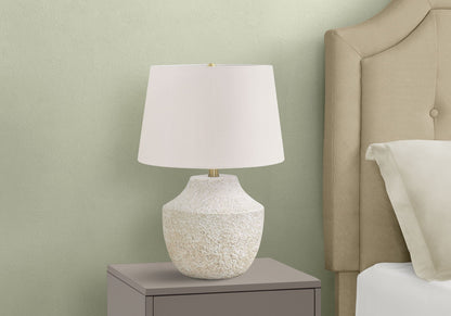 Lighting, modern concrete-cream table lamp with white shade and brass accent on nightstand on Tampa Home & Garden Store