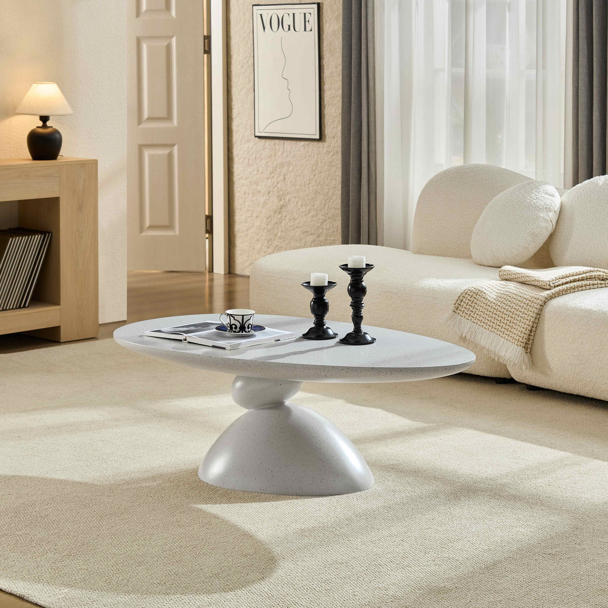 Lucky Stone Shaped End Table with Sculptural Base in speckled white, cozy living room on Tampa Home & Garden Store
