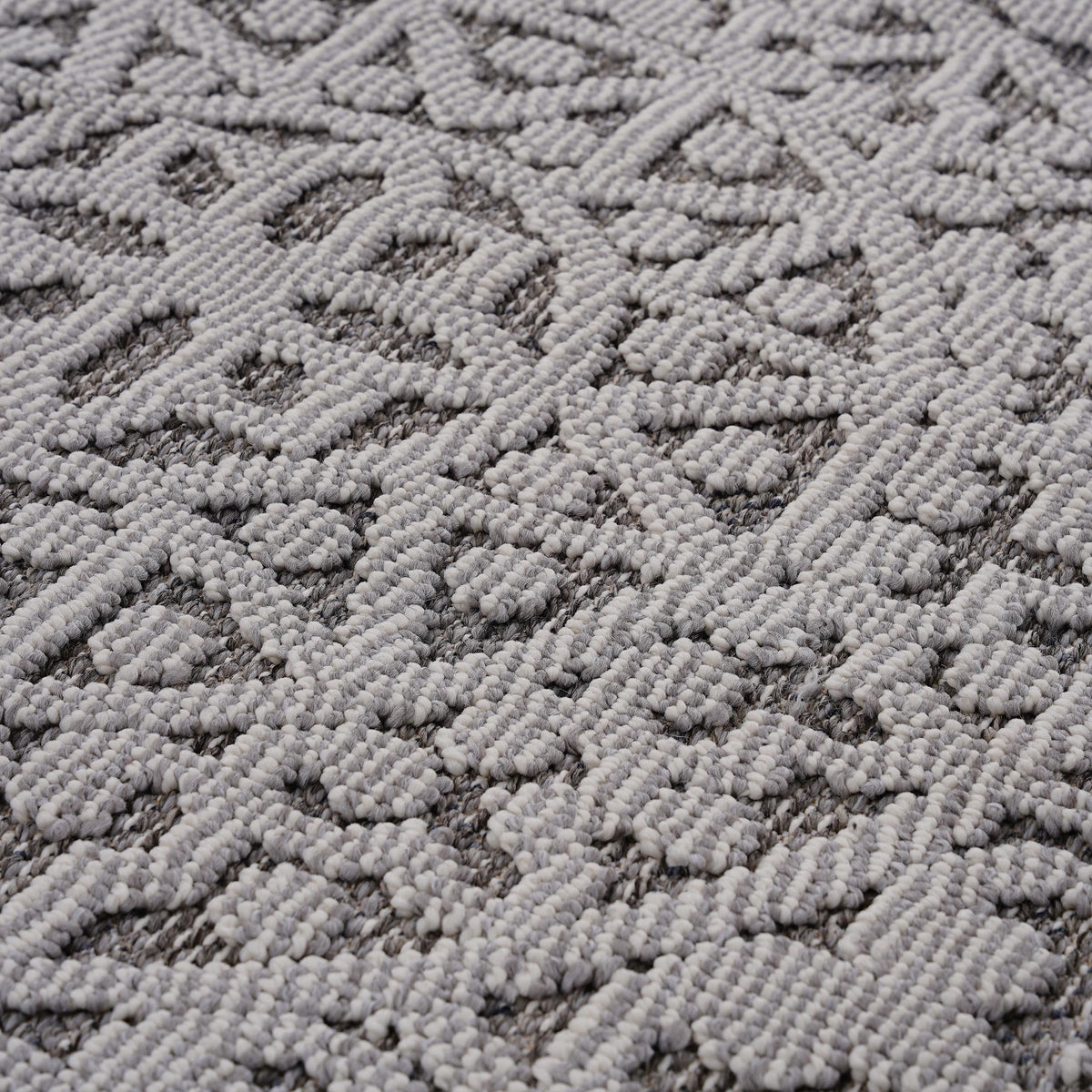 Stain Resistant Soft Pile Area Rug in grey and white with textured loop fibers on Tampa Home & Garden Store