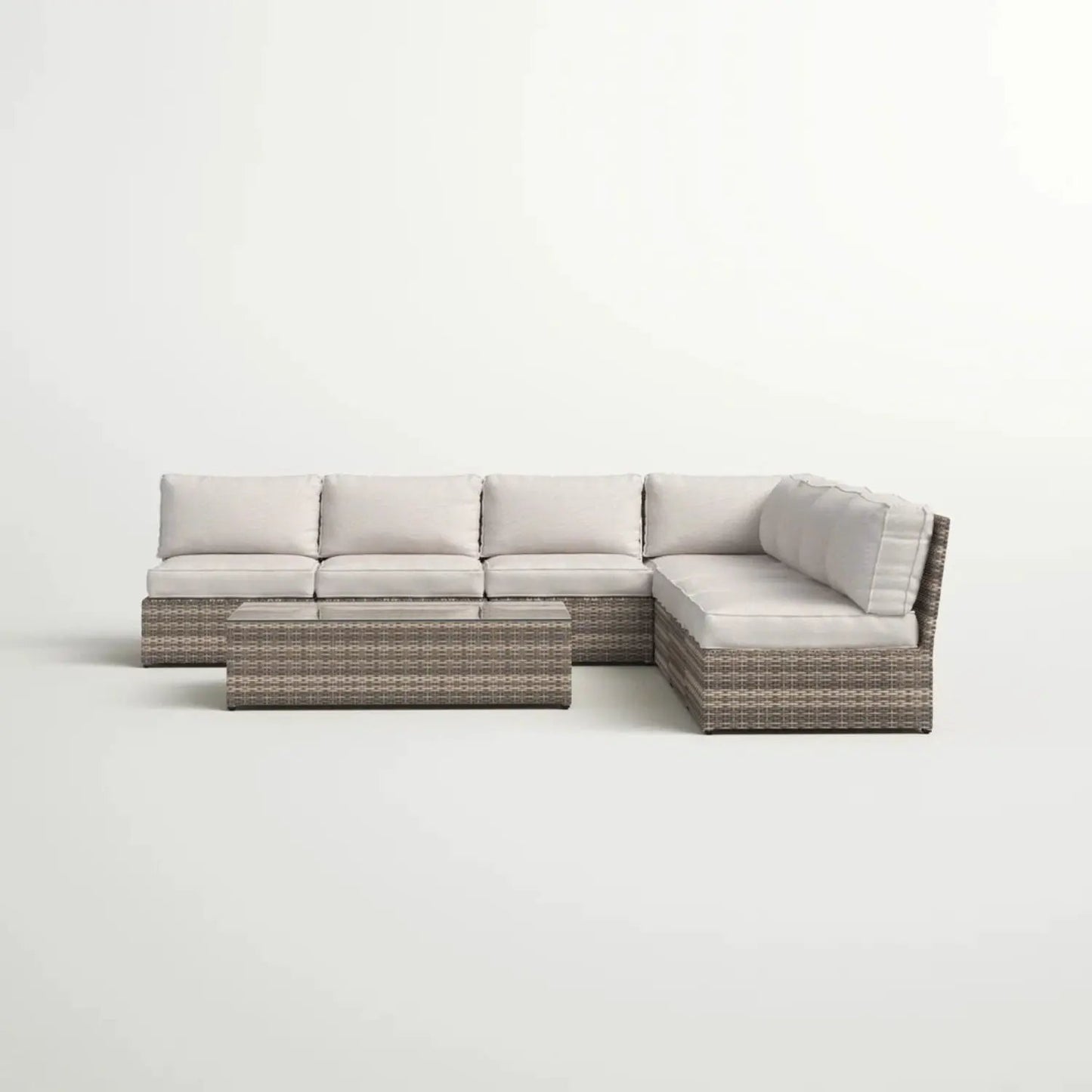 2-piece outdoor rattan sectional with beige cushions and matching coffee table on Tampa Home & Garden Store