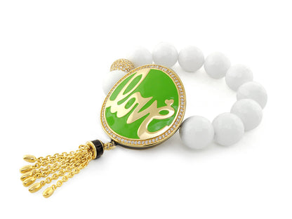 Love Rocks bracelet white bead stretch with green enamel pendant by Lauren G Adams on Tampa Home & Garden Store