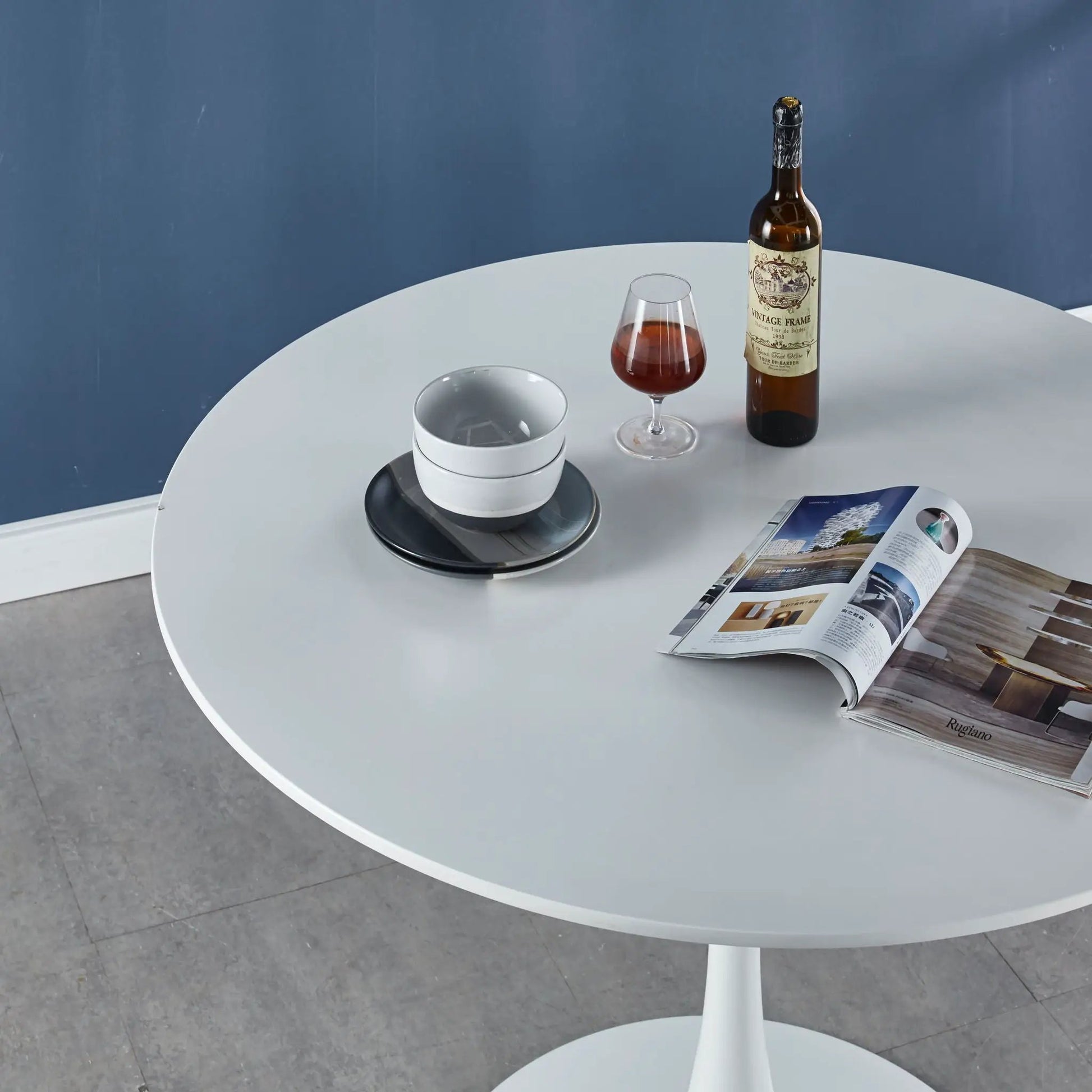 Tulip Special Dining Table round white pedestal base with wine bottle, glass and cup on Tampa Home & Garden Store