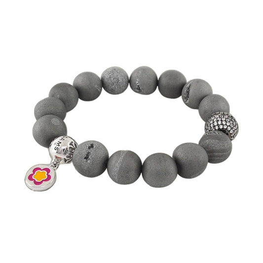 Love Rocks Bracelet by Lauren G Adams on gray matte beads with a textured surface and flower-embellished charm on Tampa Home & Garden Store