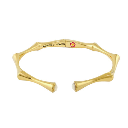 Socialite Bamboo Open Cuff gold-tone hinged bracelet by Lauren G Adams with white ends on Tampa Home & Garden Store