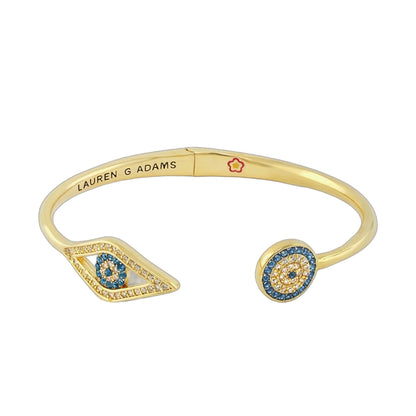 Open Arms Evil Eye Bangle gold tone hinged bracelet by Lauren G Adams with blue eye motifs on Tampa Home & Garden Store